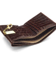 Leather purse with brass clasp, brown croc, inside