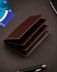 Leather bifold card wallet, brown, lifestyle