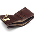 Leather purse with brass clasp, brown, inside