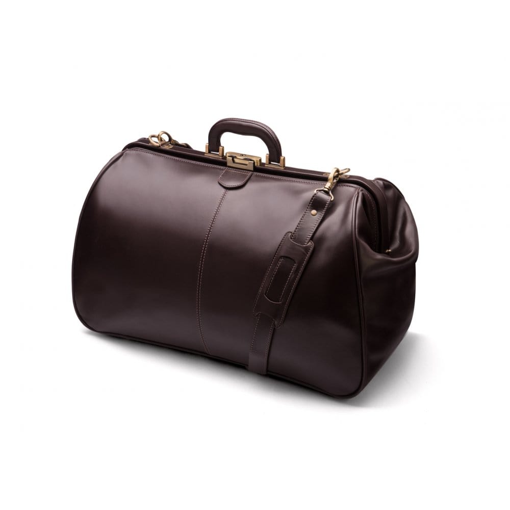 Leather Gladstone holdall, brown, side view with shoulder strap