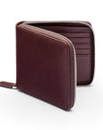 Men's leather wallet with zip around closure, brown, front