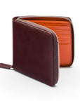 Men's leather wallet with zip around closure, brown with orange, front