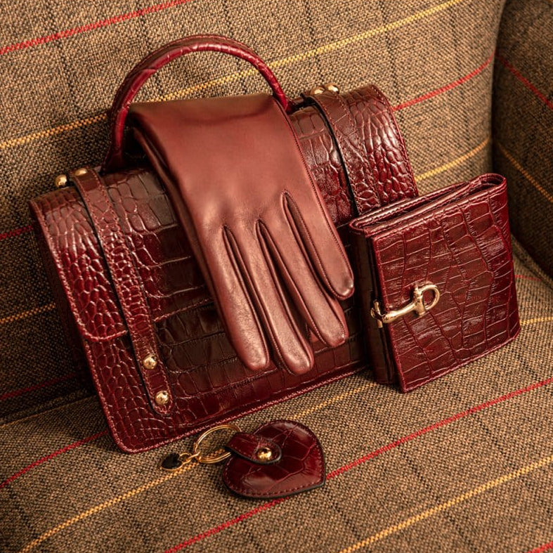 Leather purse with brass clasp, burgundy croc, lifestyle