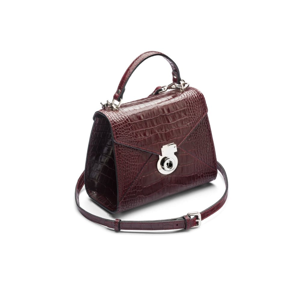 Mini Burnett small top handle bag, burgundy croc, side view