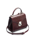 Mini Burnett small top handle bag, burgundy croc, side view