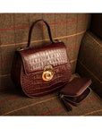 Leather rounded bottom top handle bag, burgundy croc, lifestyle