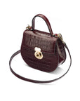 Leather rounded bottom top handle bag, burgundy croc, side