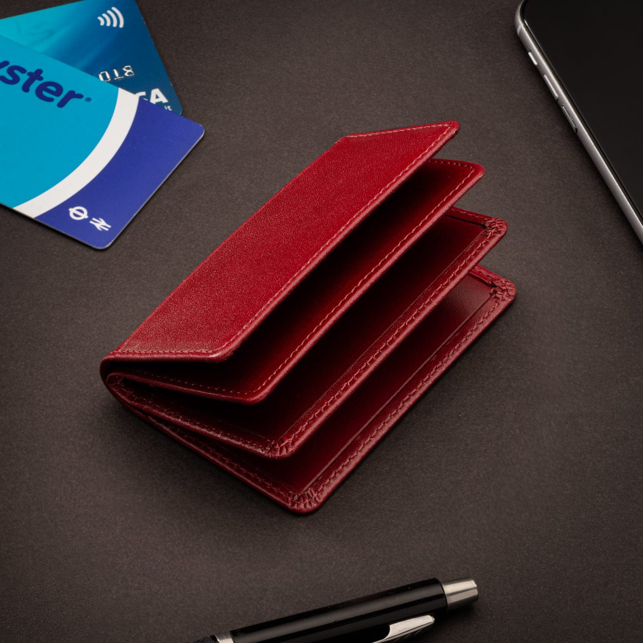 Leather bifold card wallet, burgundy, lifestyle
