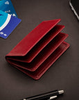 Leather bifold card wallet, burgundy, lifestyle