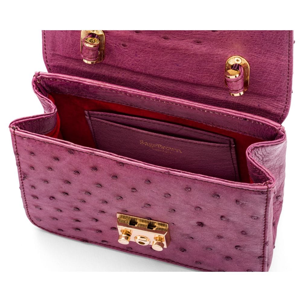 Small ostrich leather top handle bag, purple ostrich, inside