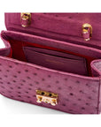 Small ostrich leather top handle bag, purple ostrich, inside