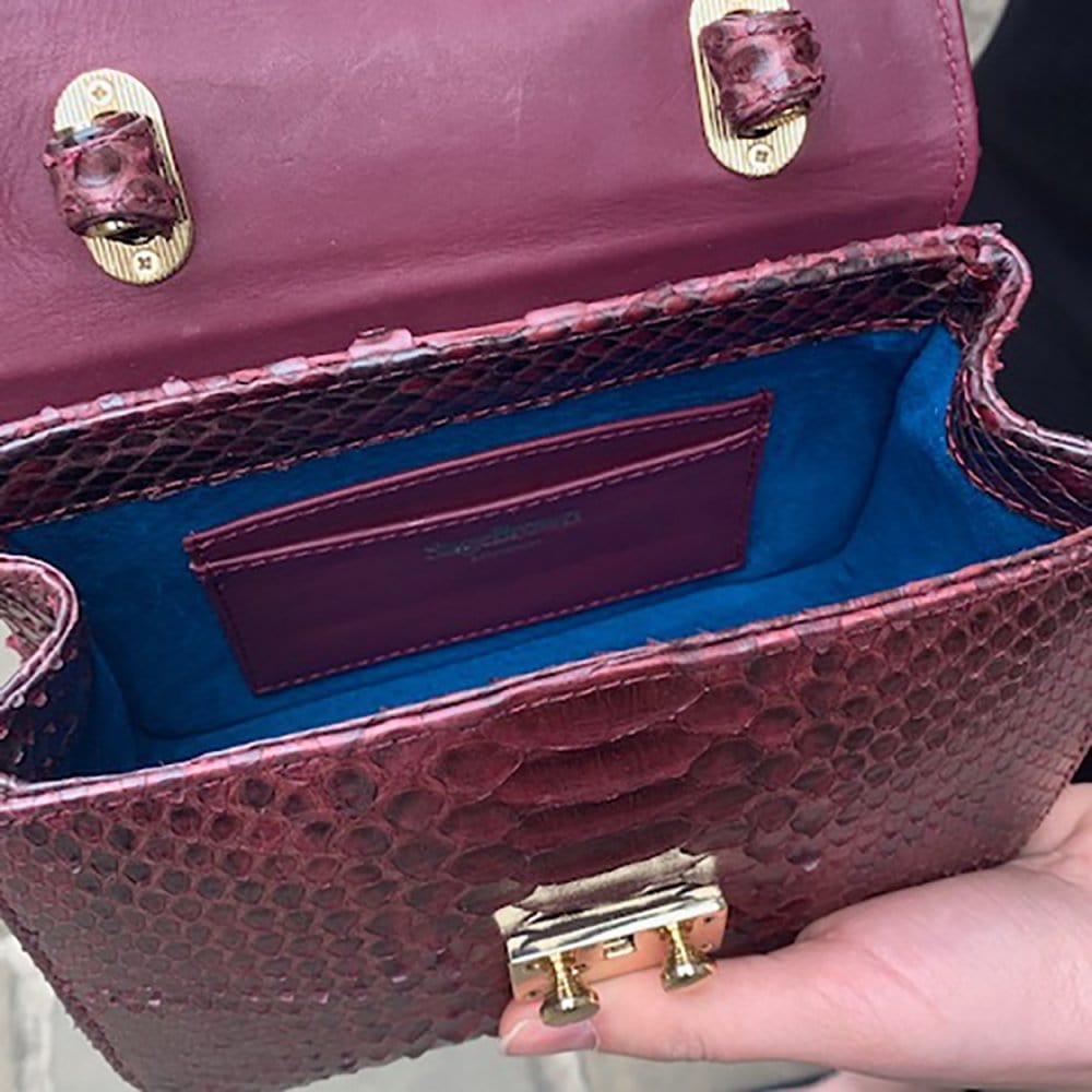 Small real python top handle bag, burgundy, inside
