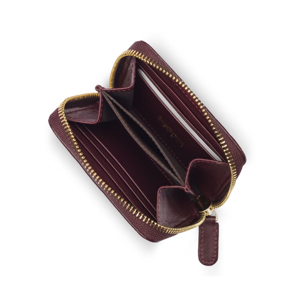 Small zip around woven leather accordion purse, burgundy, open