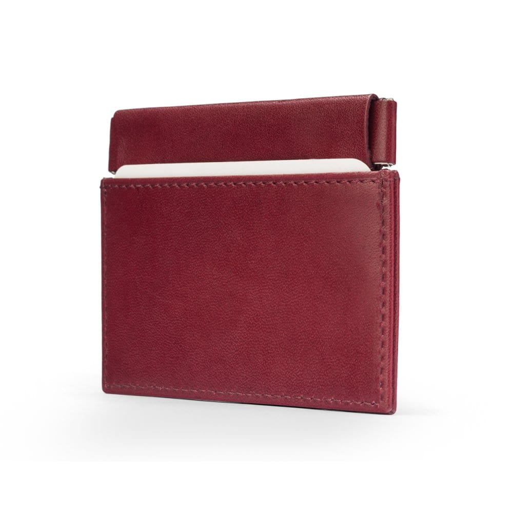 Leather squeeze spring coin purse, burgundy, side