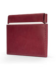 Leather squeeze spring coin purse, burgundy, side