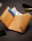 RFID blocking leather envelope purse, camel, lifestyle