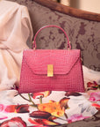 Leather top handle bag, pink croc, lifestyle