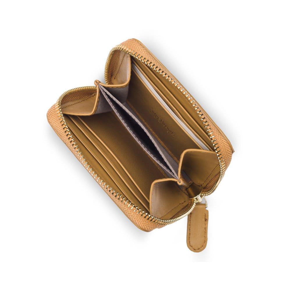 Small zip around woven leather accordion purse, caramel, interior