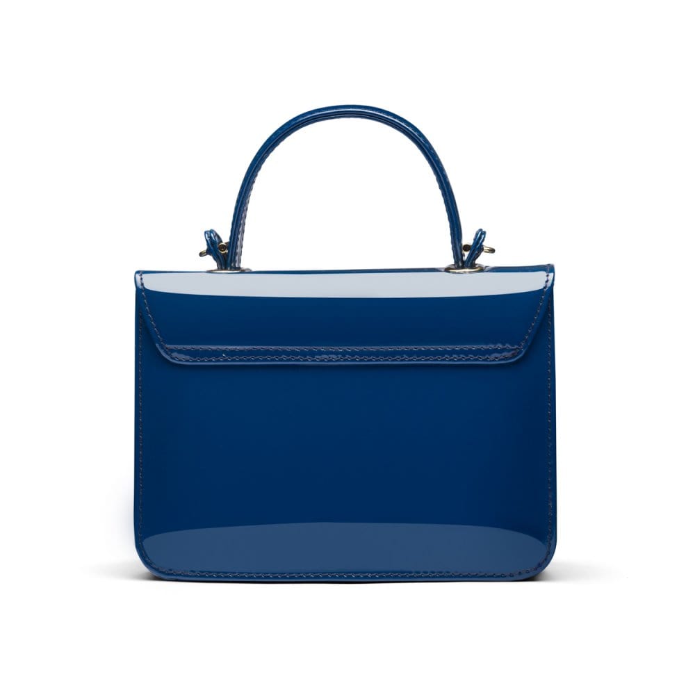 Small leather top handle bag, cobalt patent, back
