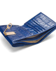 Leather purse with brass clasp, cobalt croc, inside