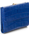 Leather purse with brass clasp, cobalt croc, back