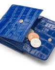 Leather purse with brass clasp, cobalt croc, open