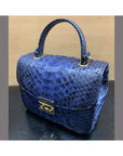 Small real python top handle bag, cobalt, side