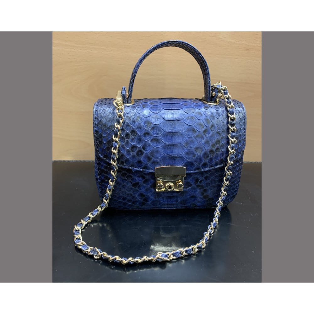 Small real python top handle bag, cobalt, with chain strap