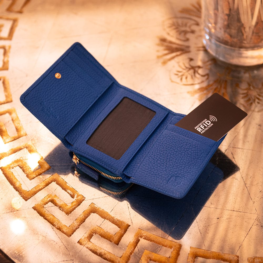 RFID blocking leather tri-fold purse, cobalt, lifestyle view