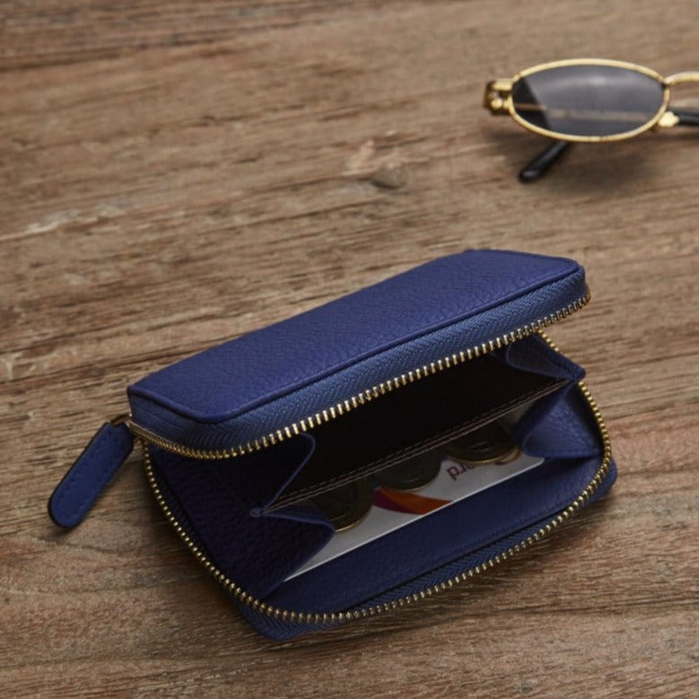 Small leather zip around coin purse, cobalt, lifestyle