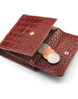 Leather purse with brass clasp, dark tan croc, open