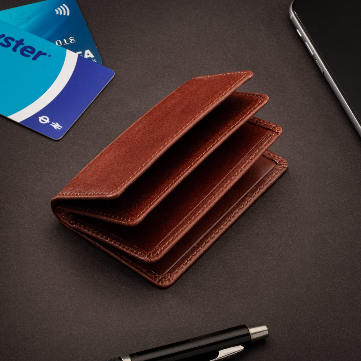 Leather bifold card wallet, dark tan, lifestyle