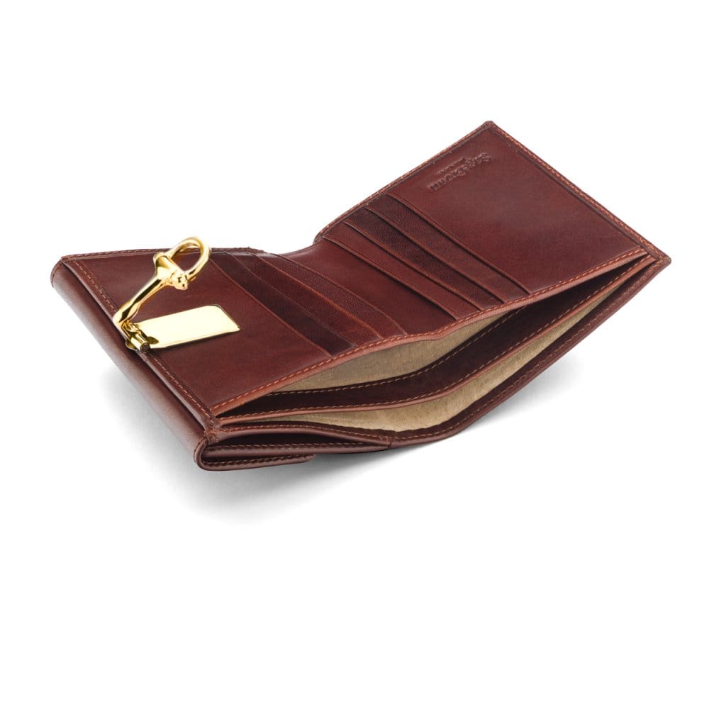 Leather purse with brass clasp, dark tan, inside