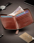 Men's leather wallet with zip around closure, dark tan, lifestyle