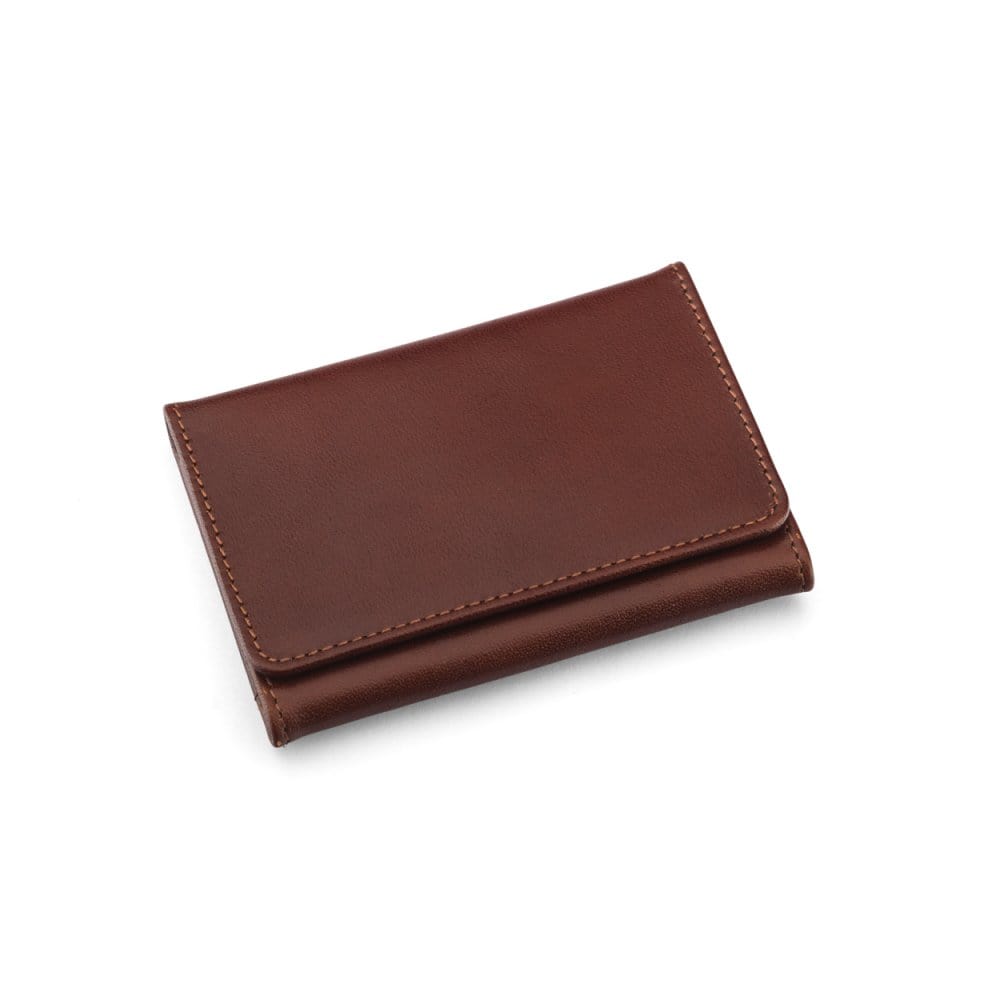 Leather tri-fold travel card holder, dark tan with cream, front
