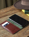 Leather iPhone 11 Pro Max wallet case, dark tan, lifestyle