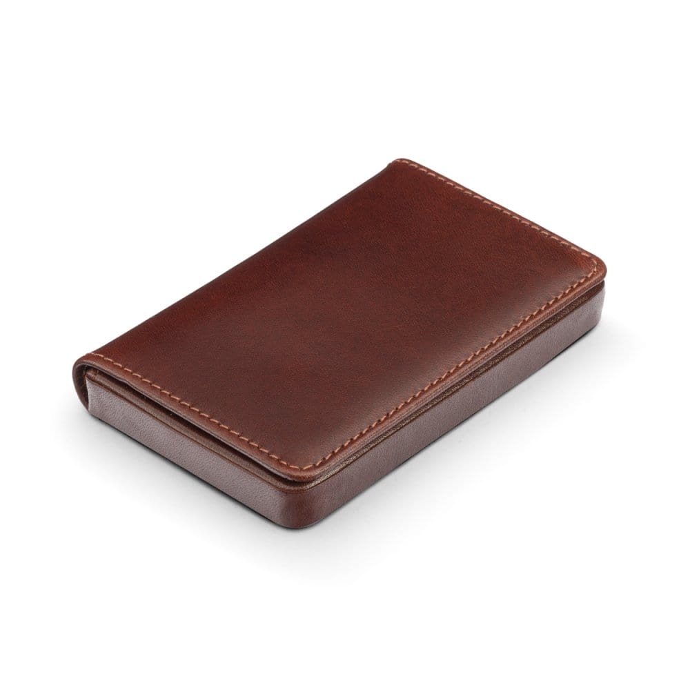 Leather business card holder with magnetic closure, dark tan with green, side