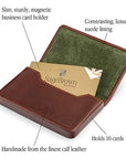 Leather business card holder with magnetic closure, dark tan with green, features