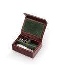 Small leather accessory box, dark tan with green, open