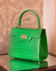 Mini leather Morgan Bag, top handle bag, emerald croc, lifestyle