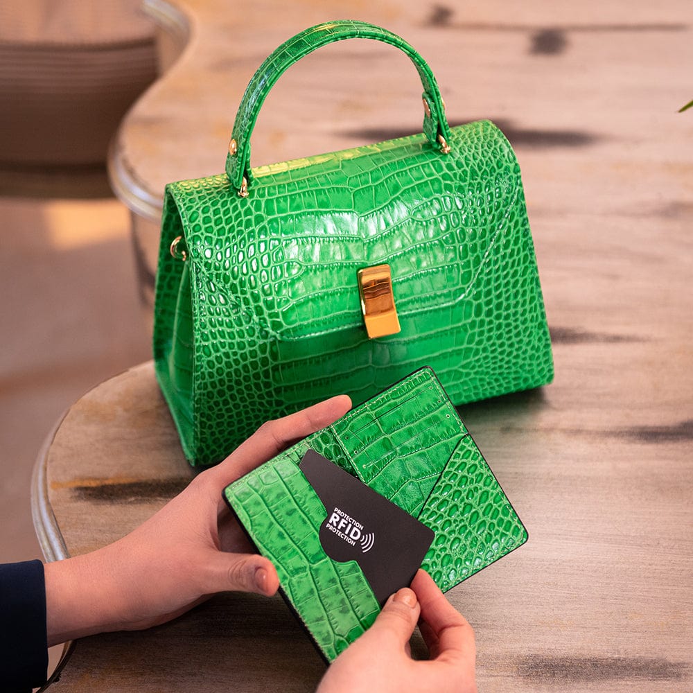 RFID compact credit card wallet, emerald croc, lifestyle