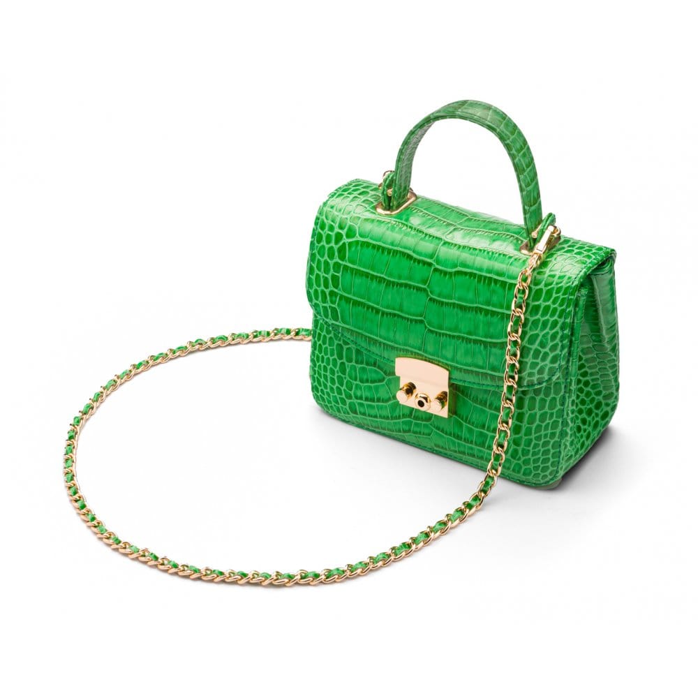 Small leather top handle bag, emerald croc, side