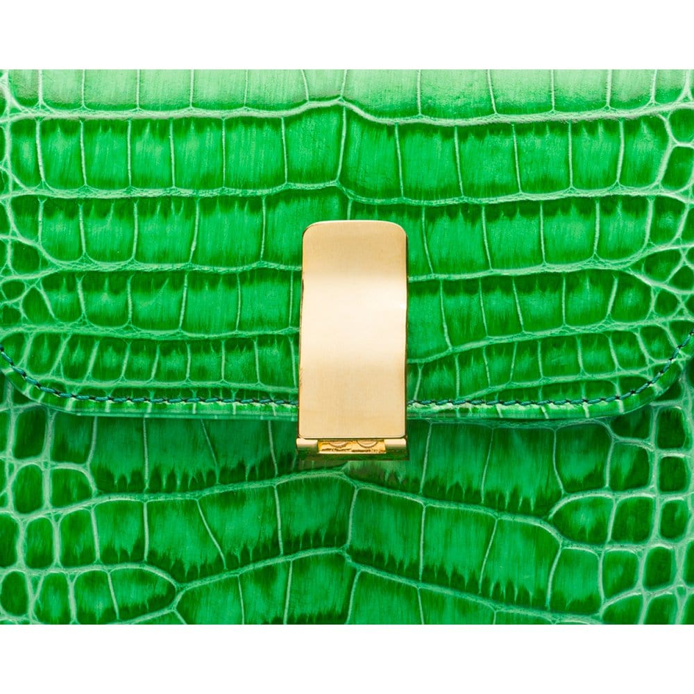 Leather top handle bag, emerald green croc, lock close up