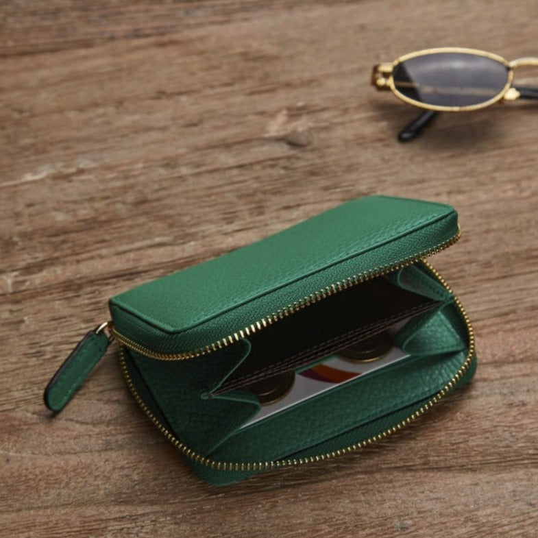 Small leather zip around coin purse, emerald green, lifestyle