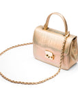 Small leather top handle bag, gold croc, side