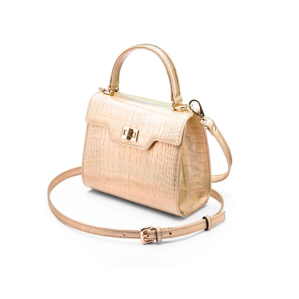 Mini leather Morgan Bag, top handle bag, gold croc, side view