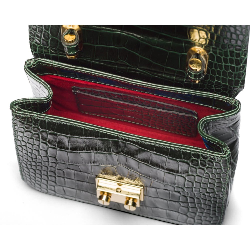 Small leather top handle bag, green croc, inside