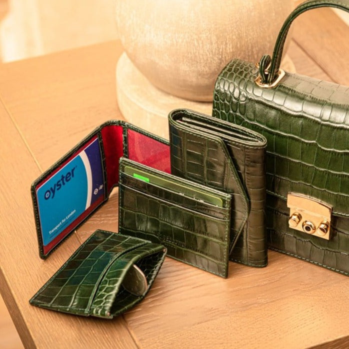 Flat leather card wallet with ID window, green croc, lifestyle