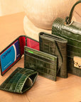 Flat leather card wallet with ID window, green croc, lifestyle