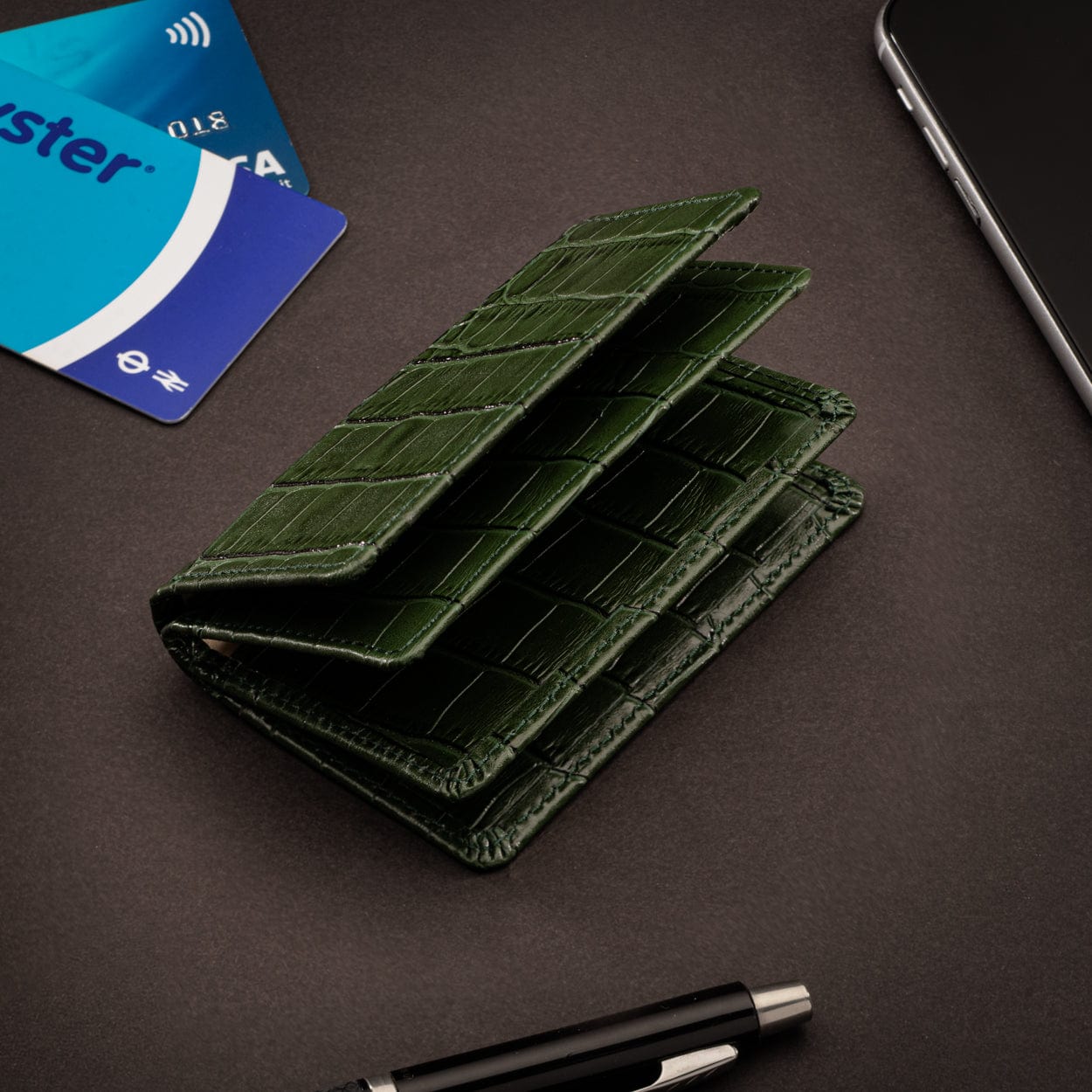 Leather bifold card wallet, green croc, lifestyle